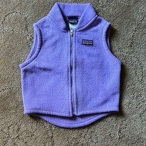 Patagonia white fuzzy vest.  Size 6M. Lots of life left!!